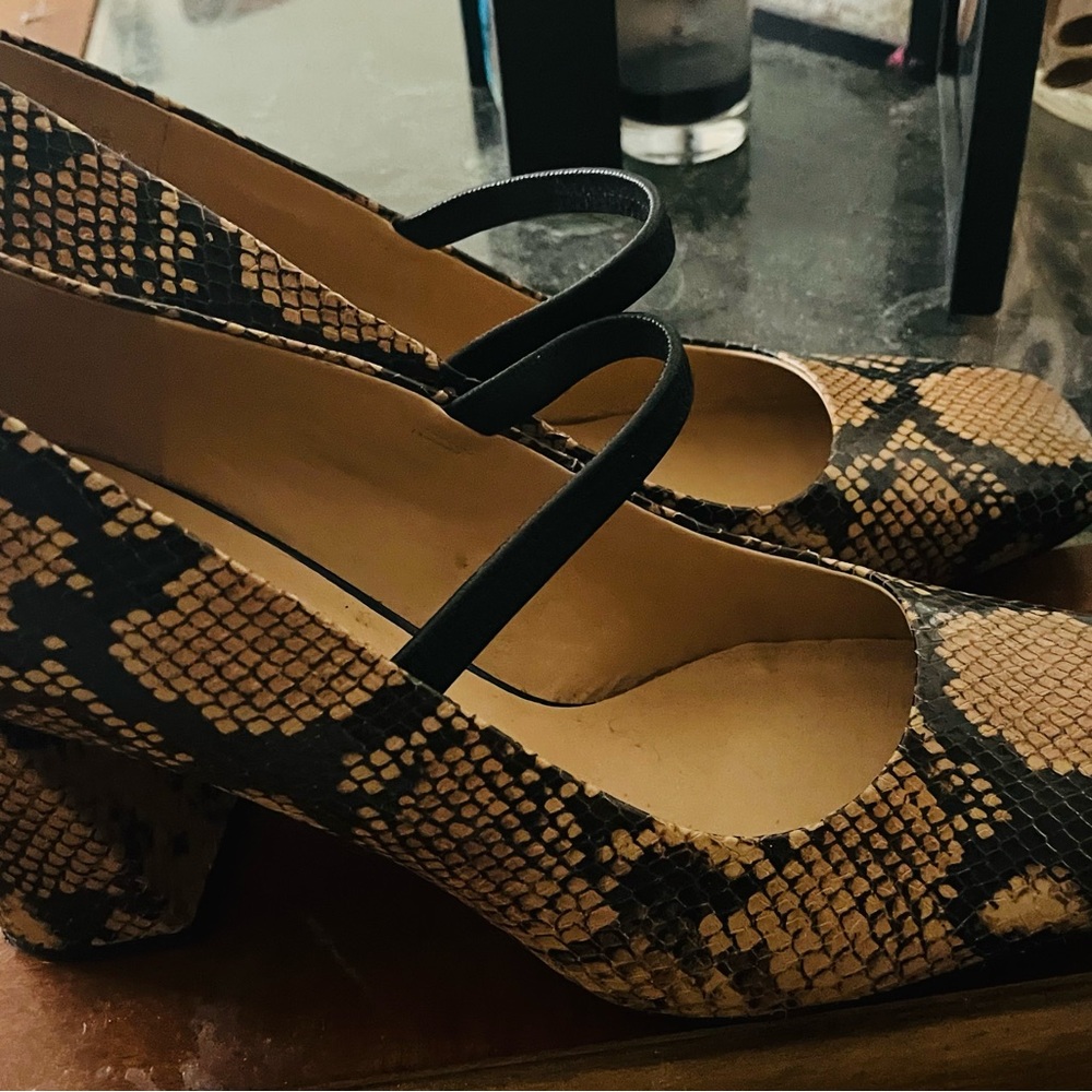 Size 11 barely worn leopard heels.
